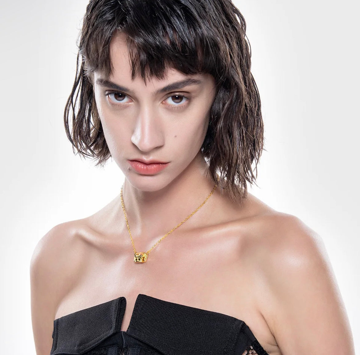 Ruby Nip Stainless Steel Bust Necklace